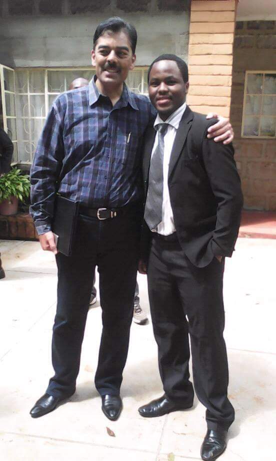 Dr. Vimal Shah with ALU-Rwanda student, Wahome